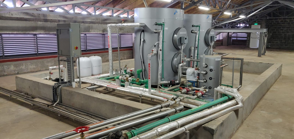 an industrial water heating plant with pipes and valves